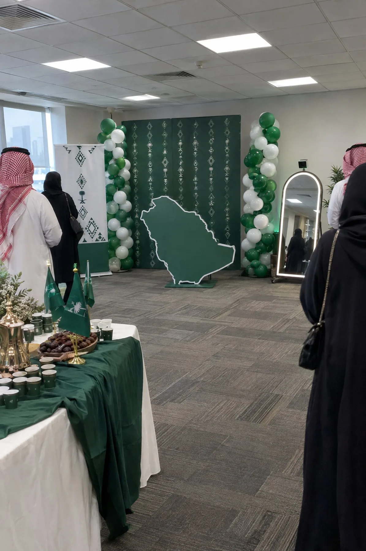 A staff celebration in an office dressed for National Day