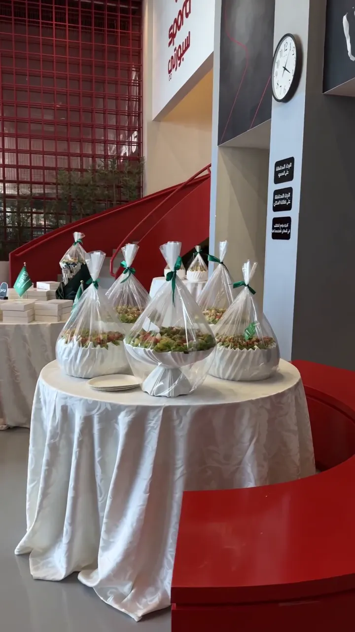Round hospitality tables with white cloths